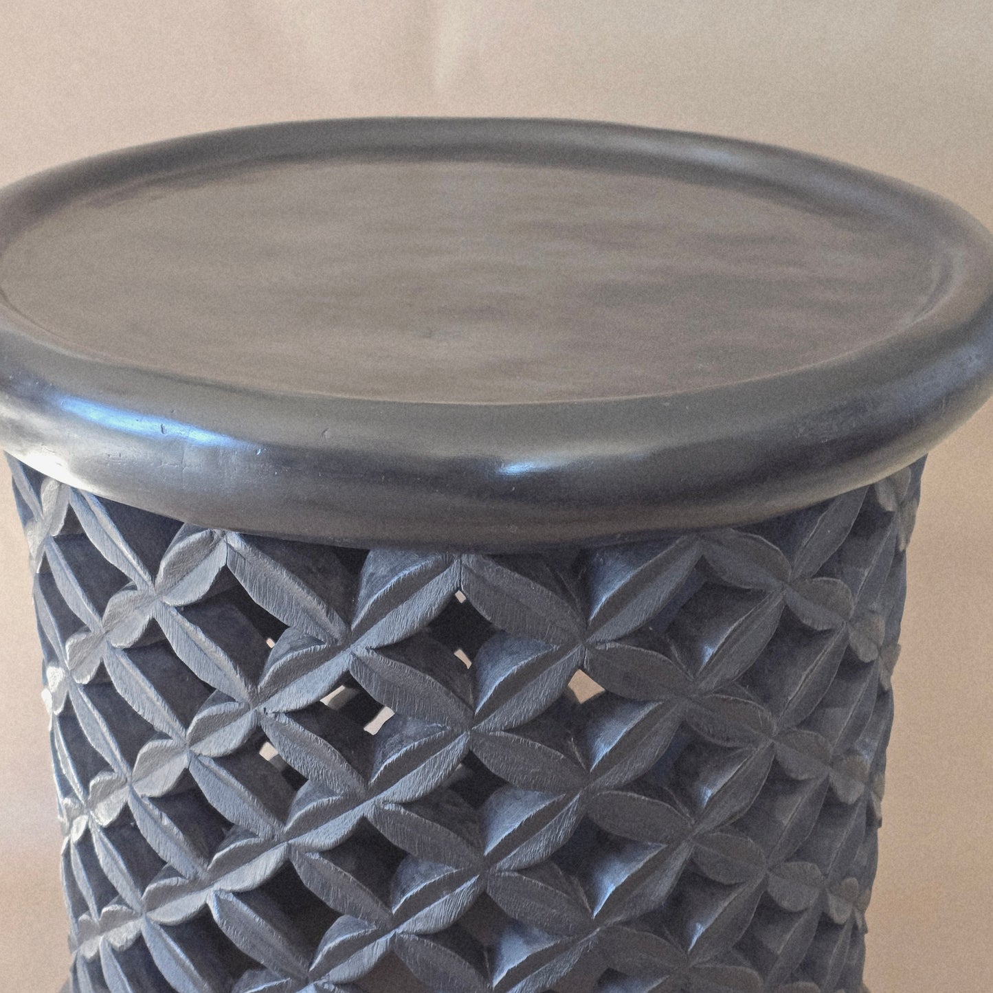 Hand crafted from a tree trunk and hand carved/bamileke stools/ 24 inches