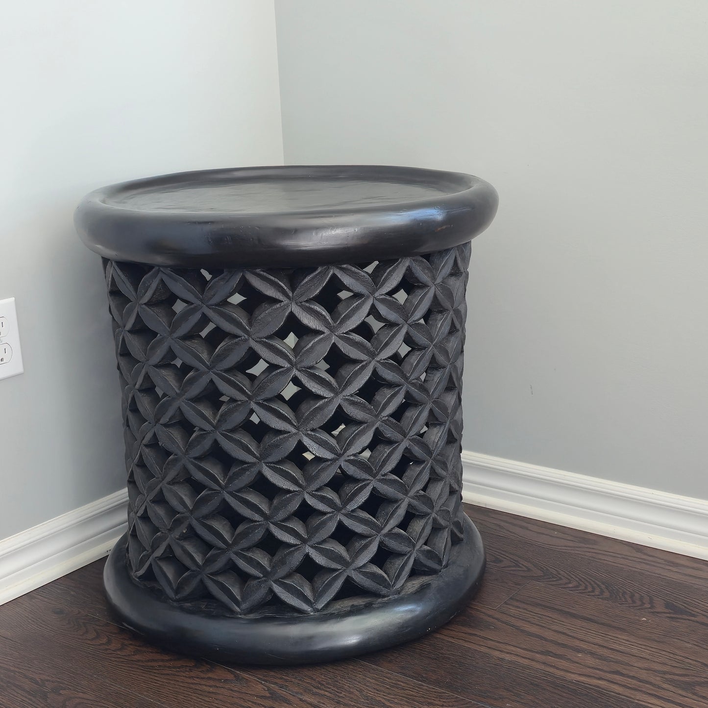 Hand crafted from a tree trunk and hand carved/bamileke stools/ 24 inches