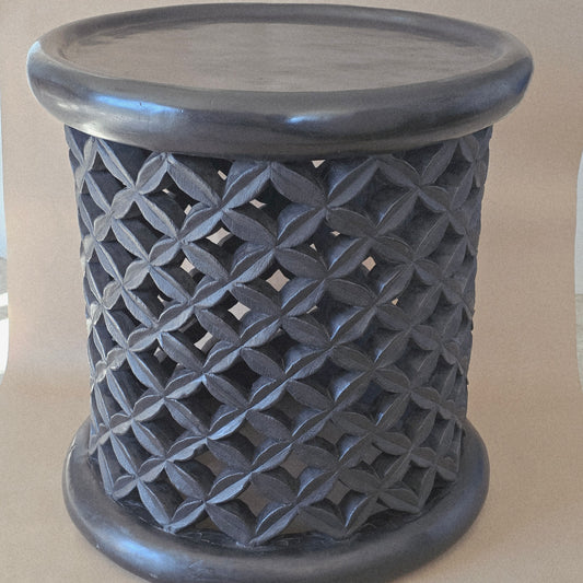 Hand crafted from a tree trunk and hand carved/bamileke stools/ 24 inches